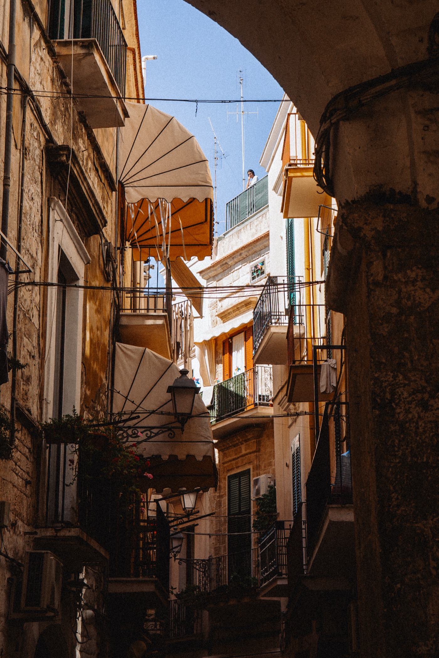 A whitewashed lane in the Puglian heat.